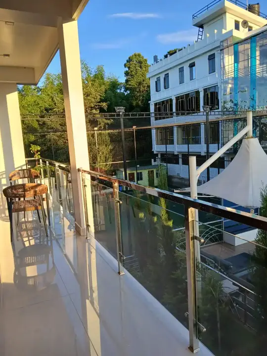 Grand Pool View Suite balcony overlooking the pool