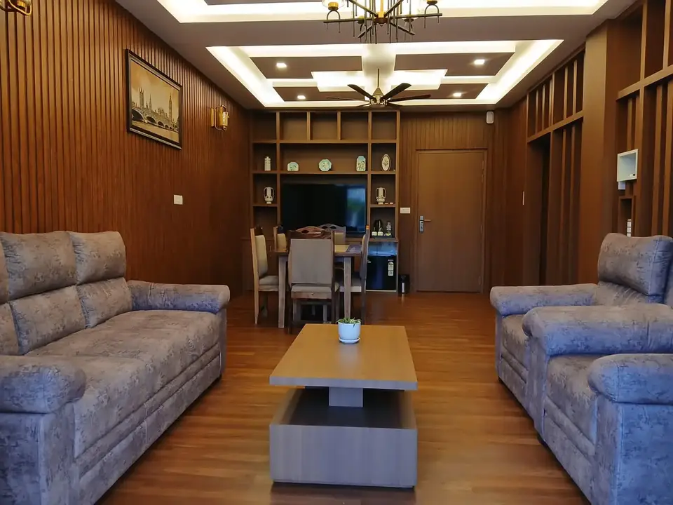 Grand Pool View Suite living area with sofas